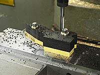 Spiers shoulder plane - cutting the ebony infill. Spiers shoulder plane - cutting the ebony infill.